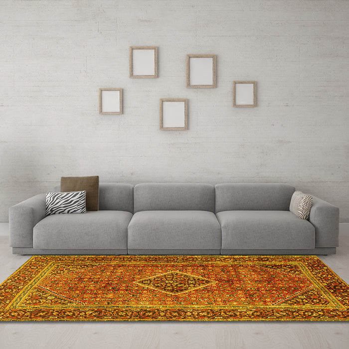 Machine Washable Medallion Yellow Traditional Rug in a Living Room, wshtr2881yw