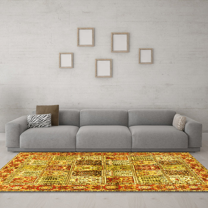 Machine Washable Persian Yellow Traditional Rug in a Living Room, wshtr2968yw