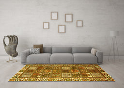 Machine Washable Persian Yellow Traditional Rug in a Living Room, wshtr2994yw