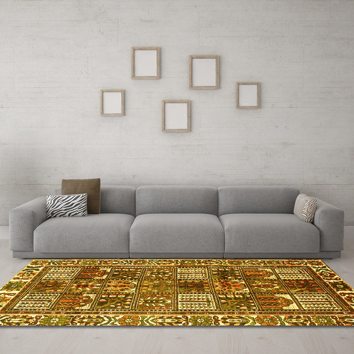 Machine Washable Persian Yellow Traditional Rug in a Living Room, wshtr2994yw