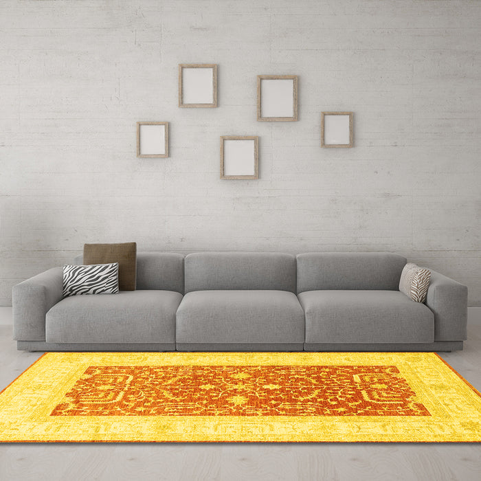 Machine Washable Oriental Yellow Traditional Rug in a Living Room, wshtr3021yw