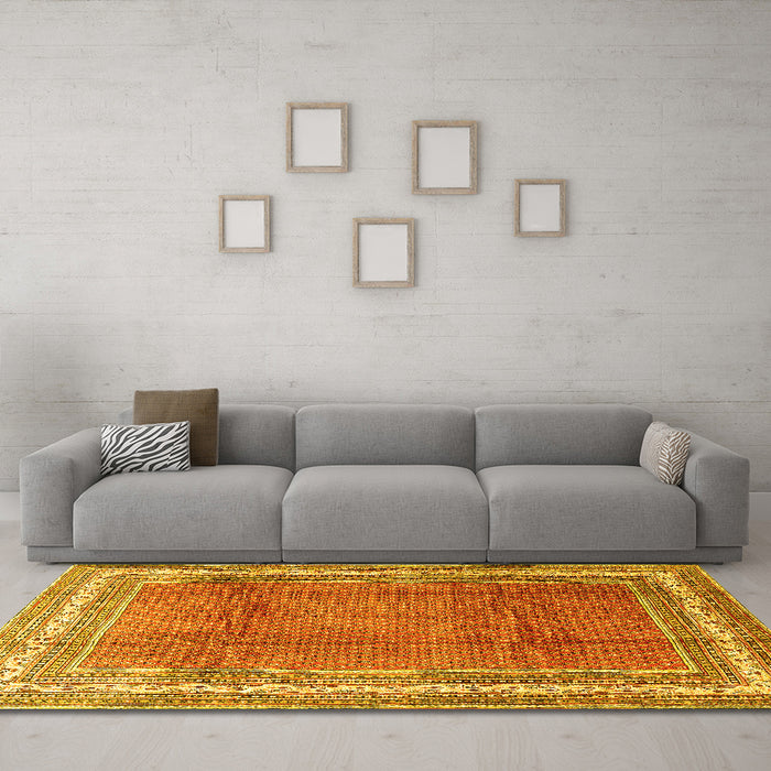 Machine Washable Persian Yellow Traditional Rug in a Living Room, wshtr3402yw