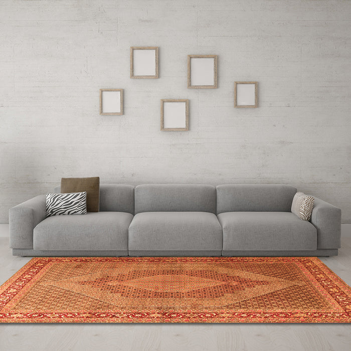 Machine Washable Medallion Orange Traditional Area Rugs in a Living Room, wshtr3474org