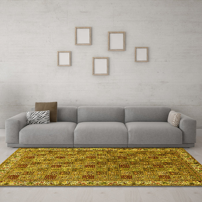 Machine Washable Persian Yellow Traditional Rug in a Living Room, wshtr3512yw