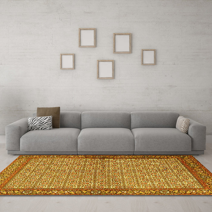 Machine Washable Persian Yellow Traditional Rug in a Living Room, wshtr3513yw