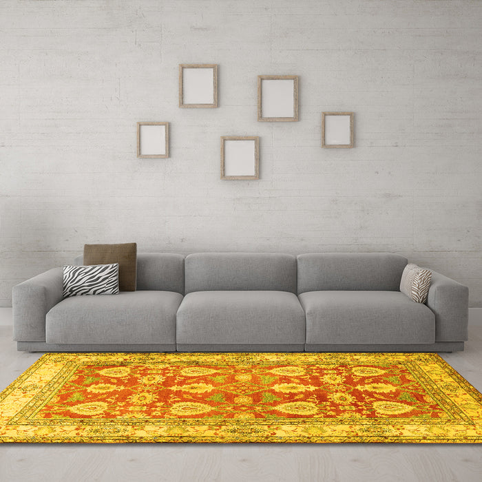 Machine Washable Oriental Yellow Traditional Rug in a Living Room, wshtr3519yw