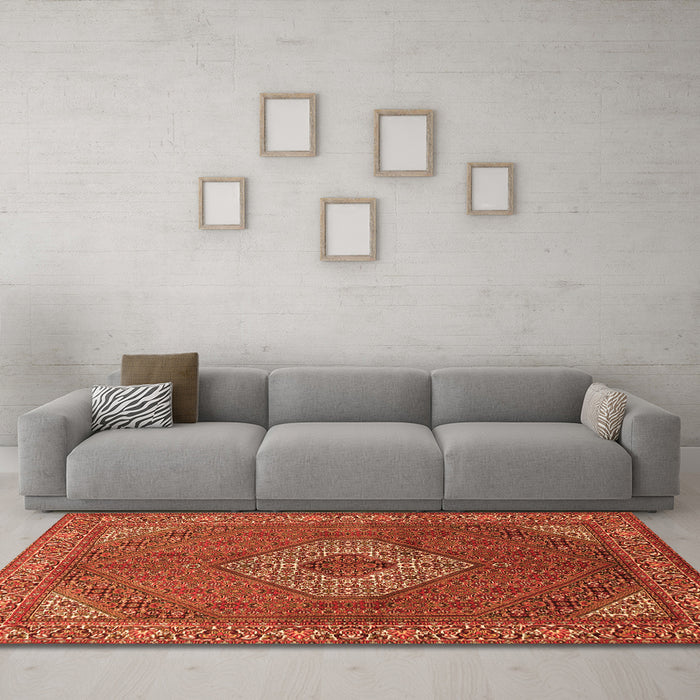 Machine Washable Medallion Orange Traditional Area Rugs in a Living Room, wshtr3559org