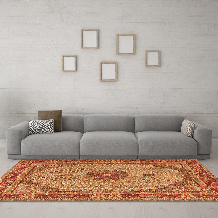 Machine Washable Medallion Orange Traditional Area Rugs in a Living Room, wshtr3590org