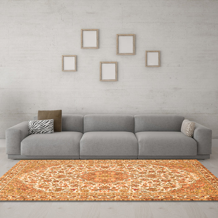 Machine Washable Medallion Orange Traditional Area Rugs in a Living Room, wshtr371org