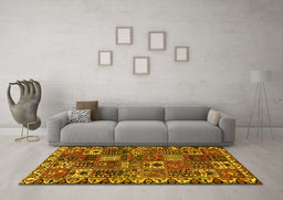 Machine Washable Persian Yellow Traditional Rug in a Living Room, wshtr3807yw