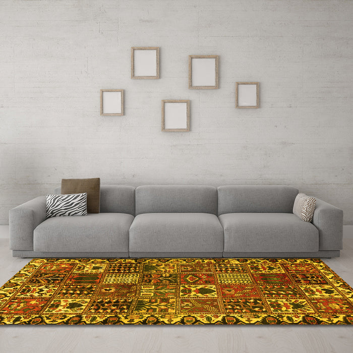 Machine Washable Persian Yellow Traditional Rug in a Living Room, wshtr3807yw