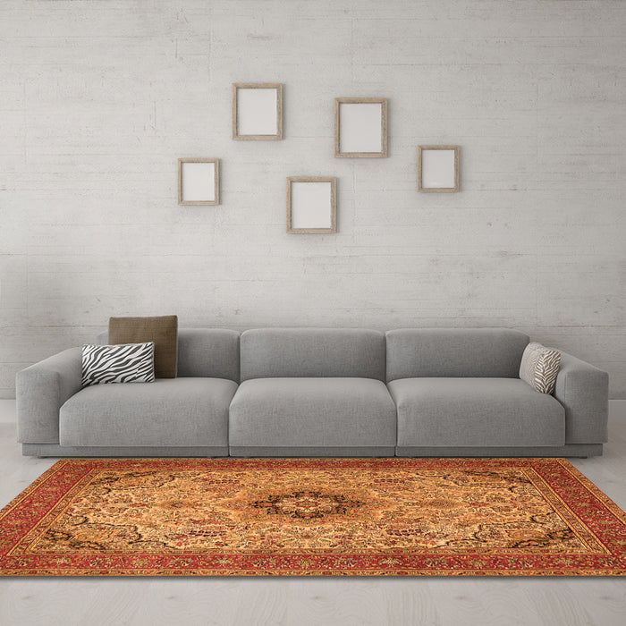 Machine Washable Medallion Orange Traditional Area Rugs in a Living Room, wshtr385org