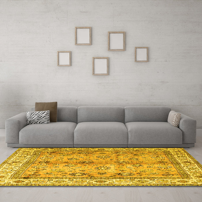 Machine Washable Oriental Yellow Traditional Rug in a Living Room, wshtr3901yw