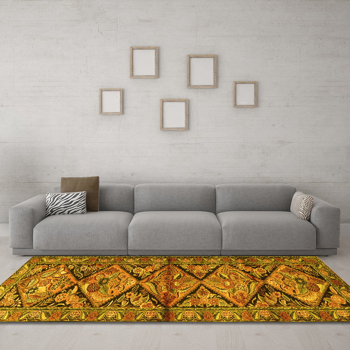 Machine Washable Persian Yellow Traditional Rug in a Living Room, wshtr3916yw