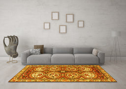 Machine Washable Persian Yellow Traditional Rug in a Living Room, wshtr4020yw