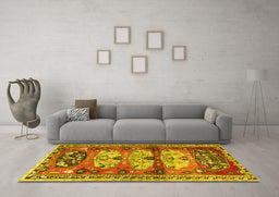 Machine Washable Persian Yellow Traditional Rug in a Living Room, wshtr4116yw