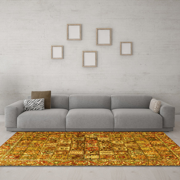 Machine Washable Persian Yellow Traditional Rug in a Living Room, wshtr4197yw