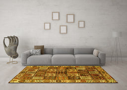 Machine Washable Persian Yellow Traditional Rug in a Living Room, wshtr426yw