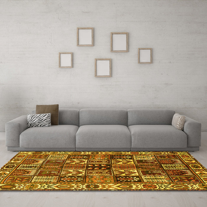 Machine Washable Persian Yellow Traditional Rug in a Living Room, wshtr426yw