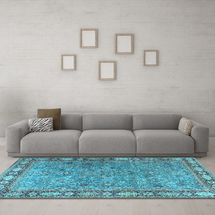 Machine Washable Animal Light Blue Traditional Rug in a Living Room, wshtr4394lblu