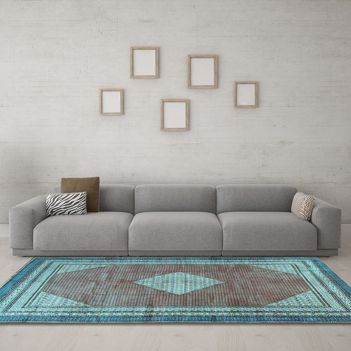 Machine Washable Medallion Light Blue Traditional Rug in a Living Room, wshtr4395lblu