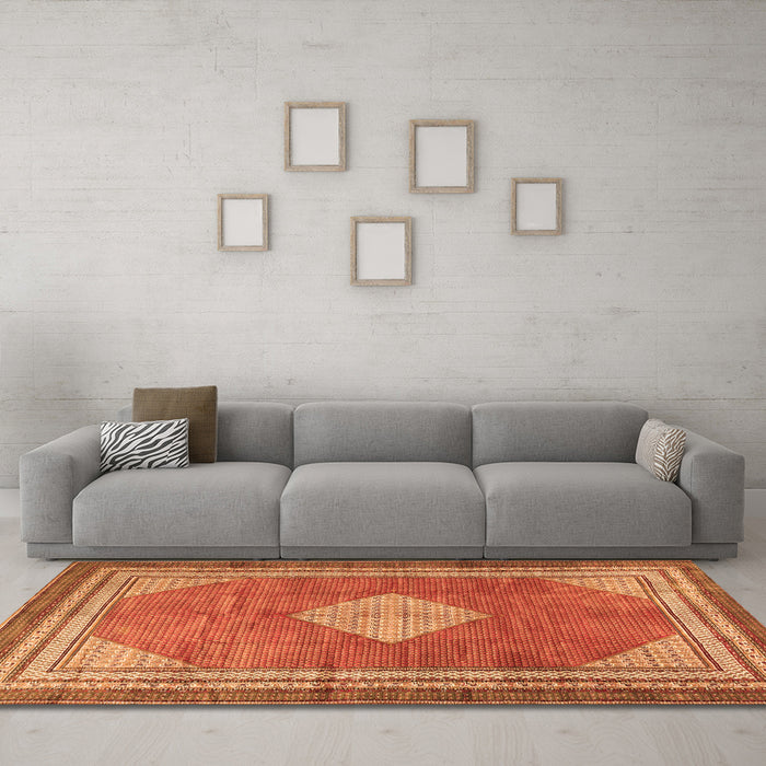Machine Washable Medallion Orange Traditional Area Rugs in a Living Room, wshtr4395org