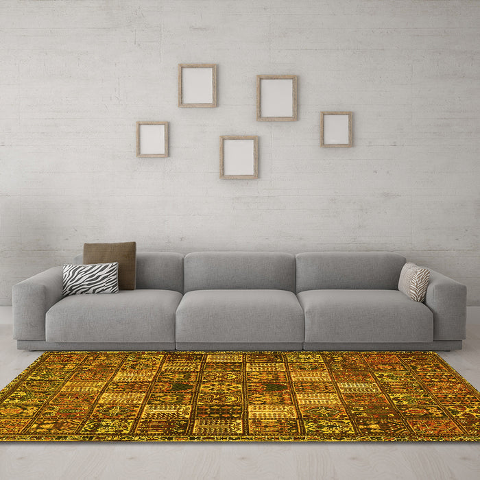 Machine Washable Persian Yellow Traditional Rug in a Living Room, wshtr4422yw