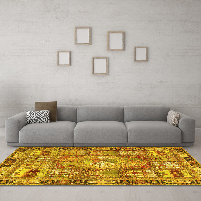 Machine Washable Medallion Yellow Traditional Rug in a Living Room, wshtr4451yw