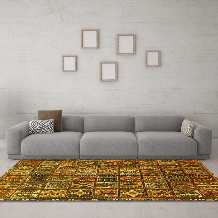 Machine Washable Persian Yellow Traditional Rug in a Living Room, wshtr4528yw
