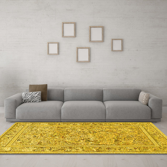 Machine Washable Animal Yellow Traditional Rug in a Living Room, wshtr4585yw