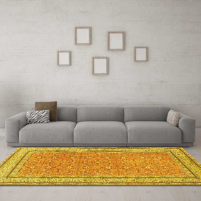 Machine Washable Oriental Yellow Traditional Rug in a Living Room, wshtr4604yw