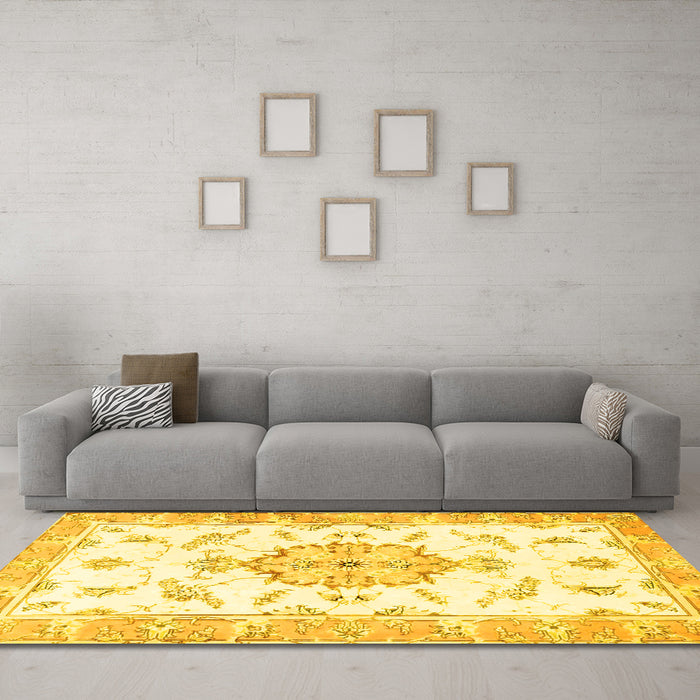 Machine Washable Medallion Yellow Traditional Rug in a Living Room, wshtr4646yw