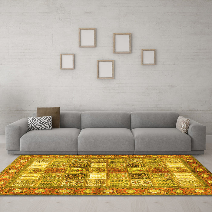 Machine Washable Persian Yellow Traditional Rug in a Living Room, wshtr4653yw