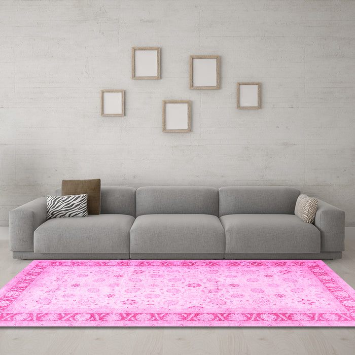 Machine Washable Oriental Pink Traditional Rug in a Living Room, wshtr4655pnk