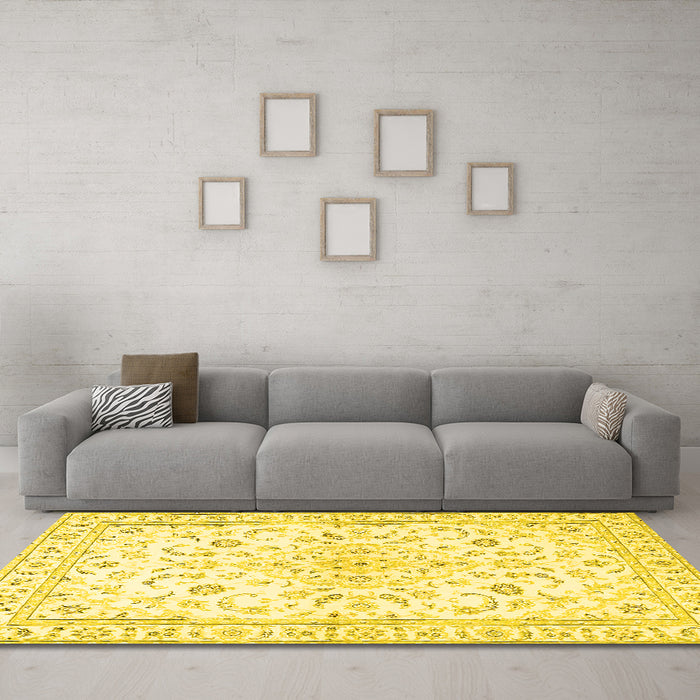 Machine Washable Medallion Yellow Traditional Rug in a Living Room, wshtr4706yw
