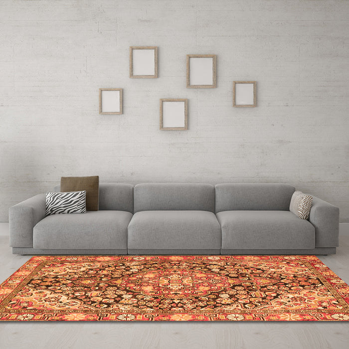 Machine Washable Medallion Orange Traditional Area Rugs in a Living Room, wshtr4723org