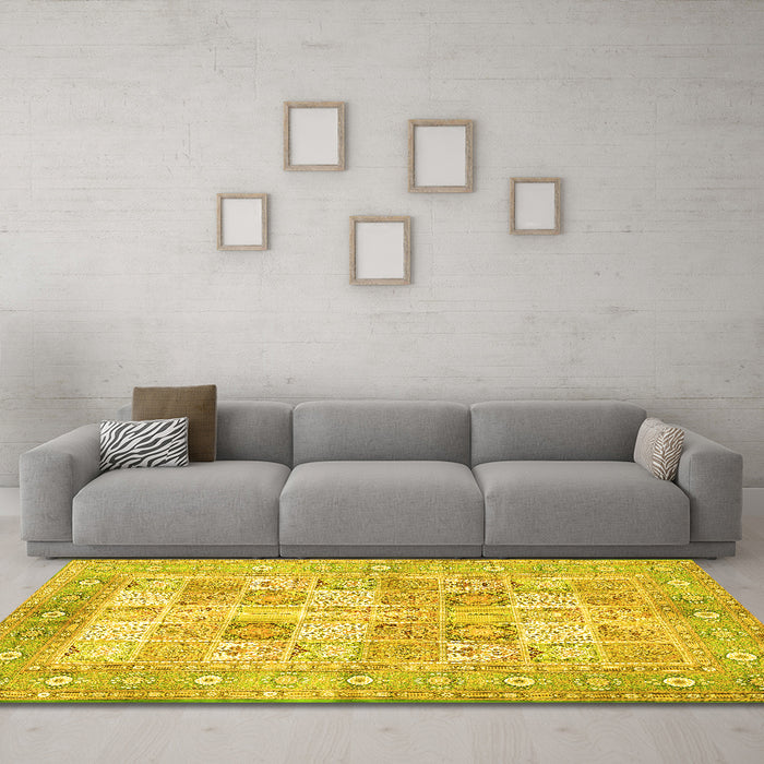 Machine Washable Persian Yellow Traditional Rug in a Living Room, wshtr4829yw