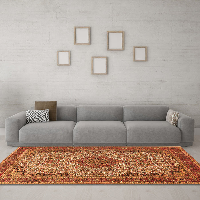 Machine Washable Medallion Orange Traditional Area Rugs in a Living Room, wshtr490org