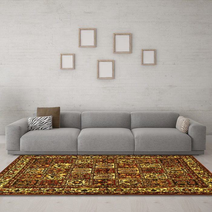 Machine Washable Animal Yellow Traditional Rug in a Living Room, wshtr491yw