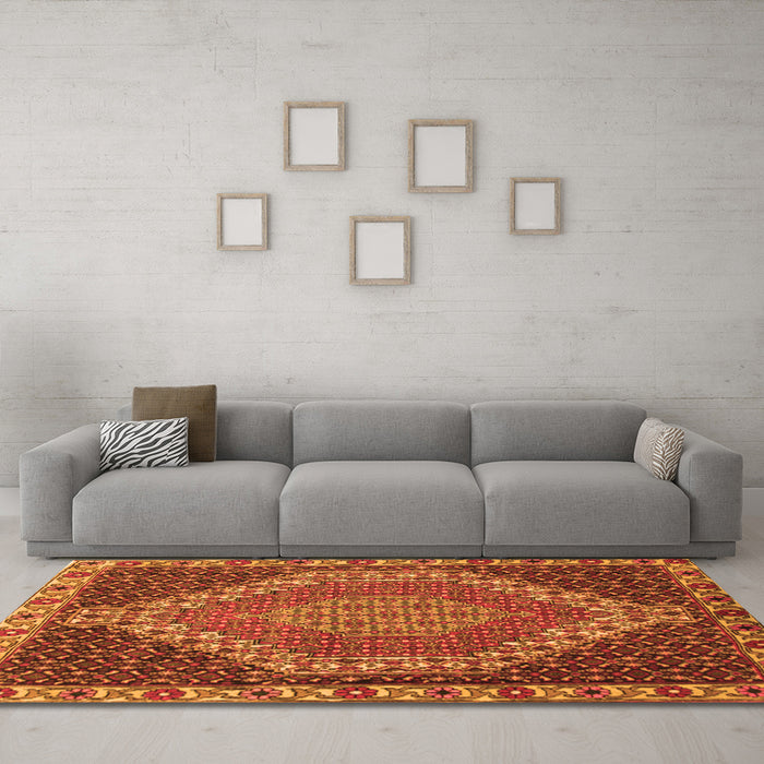 Machine Washable Medallion Orange Traditional Area Rugs in a Living Room, wshtr492org