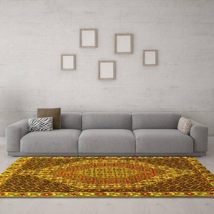 Machine Washable Medallion Yellow Traditional Rug in a Living Room, wshtr492yw