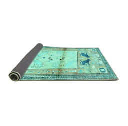 Sideview of Animal Turquoise Traditional Rug, tr526turq