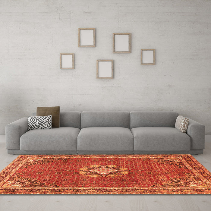 Machine Washable Medallion Orange Traditional Area Rugs in a Living Room, wshtr547org