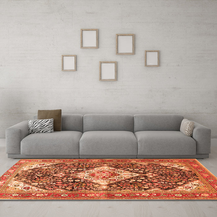 Machine Washable Medallion Orange Traditional Area Rugs in a Living Room, wshtr561org