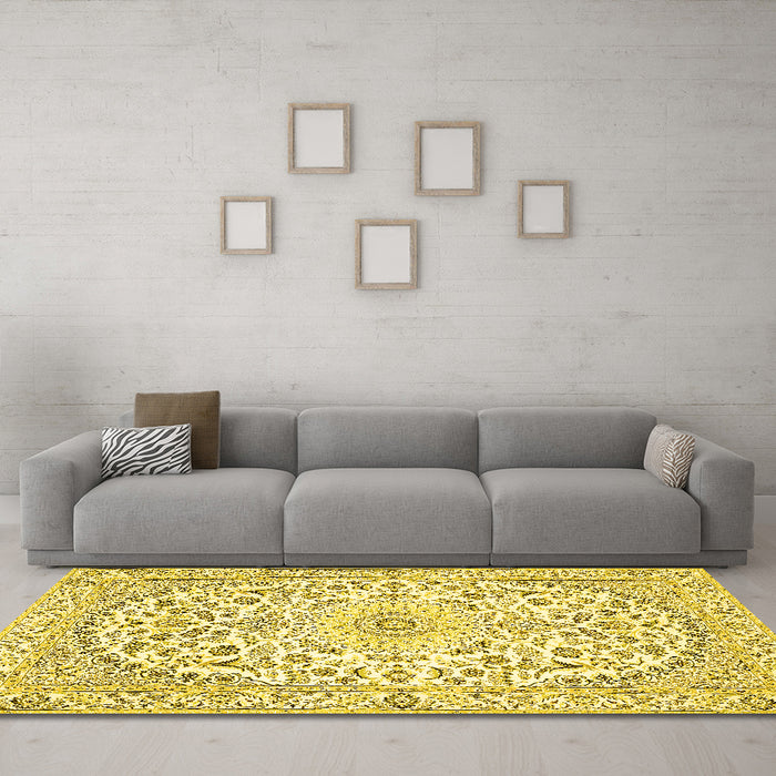 Machine Washable Medallion Yellow Traditional Rug in a Living Room, wshtr618yw