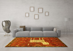 Machine Washable Animal Yellow Traditional Rug in a Living Room, wshtr630yw