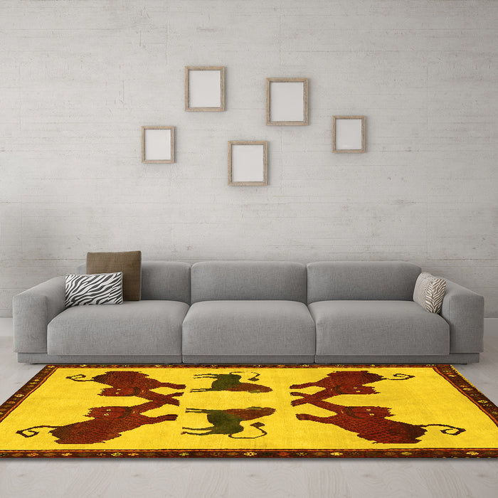 Machine Washable Animal Yellow Traditional Rug in a Living Room, wshtr857yw