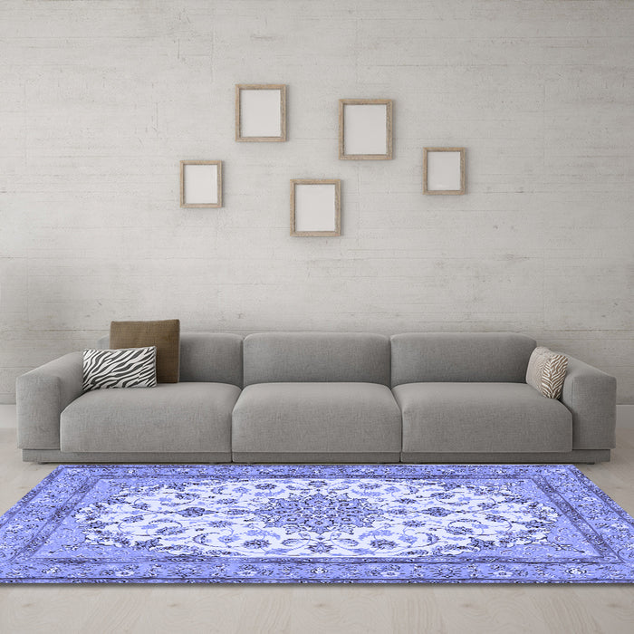 Machine Washable Medallion Blue Traditional Rug in a Living Room, wshtr943blu