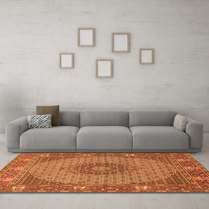 Machine Washable Medallion Orange Traditional Area Rugs in a Living Room, wshtr957org