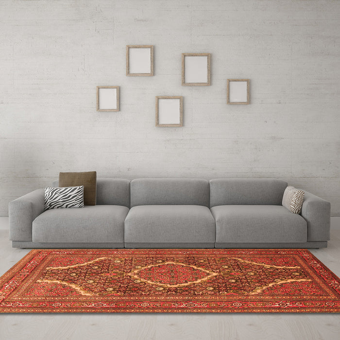 Machine Washable Medallion Orange Traditional Area Rugs in a Living Room, wshtr992org